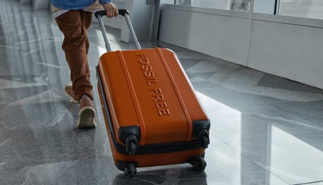 Orange resväska